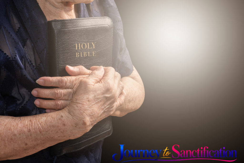 Christian holding the Bible.